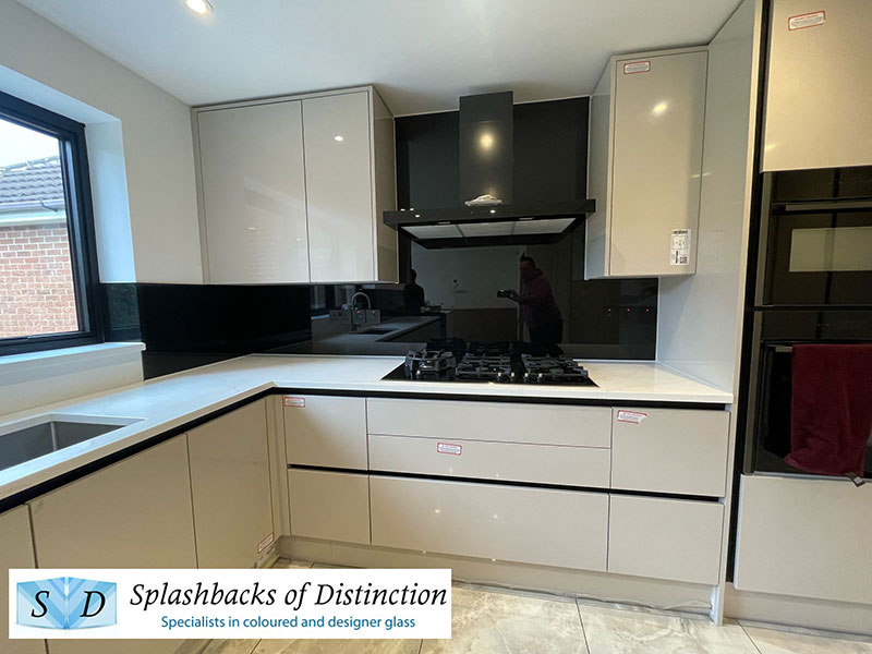 Kitchen splashback painted in graphite black installed in bedford