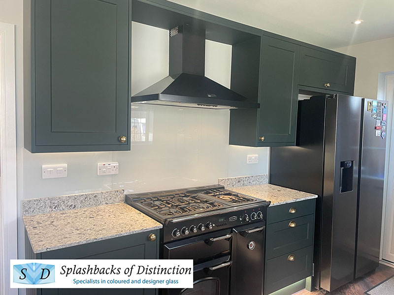 Modern grey kitchen splashback installed in a green kitchen in northampton