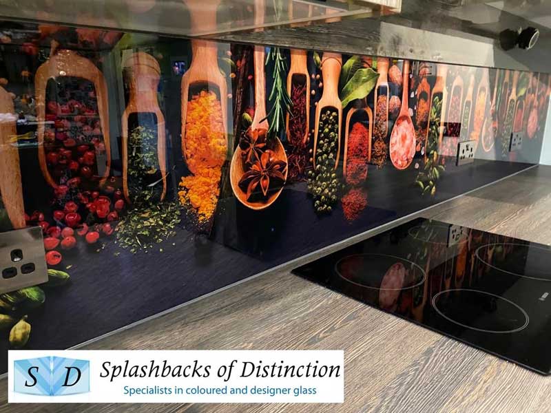 Kitchen splashback with pictures of spices