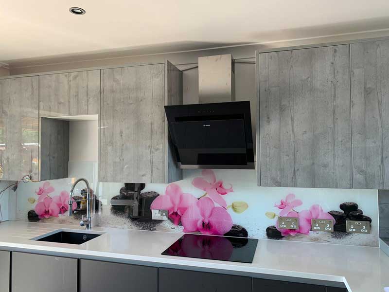 Kitchen splashback printed with adobe image of pink flowers