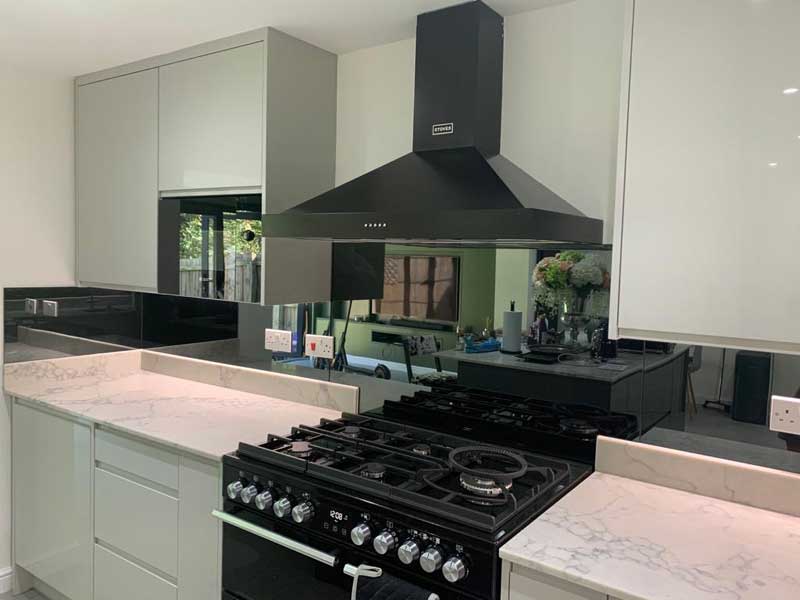 Grey toughened mirror kitchen splashback