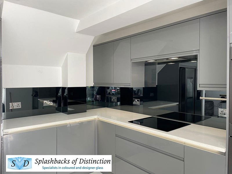 Toughened grey mirror kitchen splashback installed in cheshunt