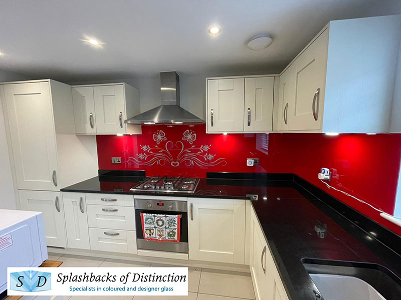 Kitchen splashback in cranberry crunch with silver glitter installed in buntingford