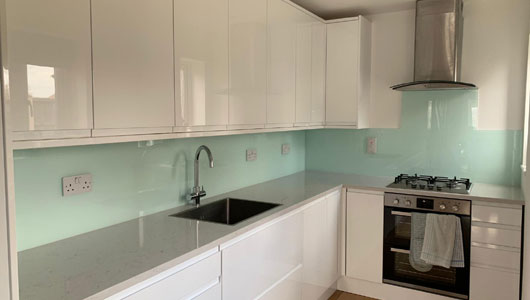 Glass white kitchen splashback